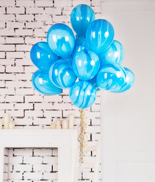blue balloons to display raw emotion
