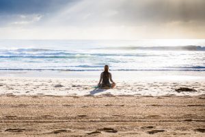 spiritual_wellbeing mediating on the beach